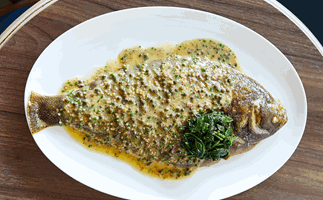 Cafe Paci in Newtown, Sydney, whole fish with yellow seeded sauce