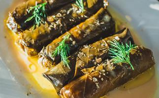 Yiamas restaurant in Perth WA. Photo of dolmades cabbage rolls sprinkled with dill and covered in sauce