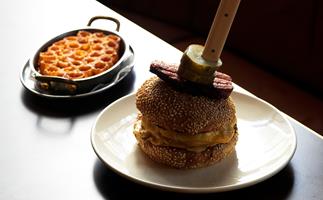 Clam Bar in Sydney CBD. Photo of its burger and honeycomb macaroni and cheese at Clam Bar in Sydney.