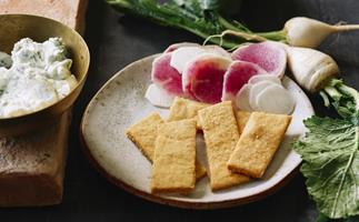 Radishes and turnips with yoghurt dip and cornmeal crackers